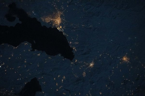 The city lights of Erciş, Türkiye, and its suburbs and villages, surround Lake Van (iss074e0043930).jpg Erdîş